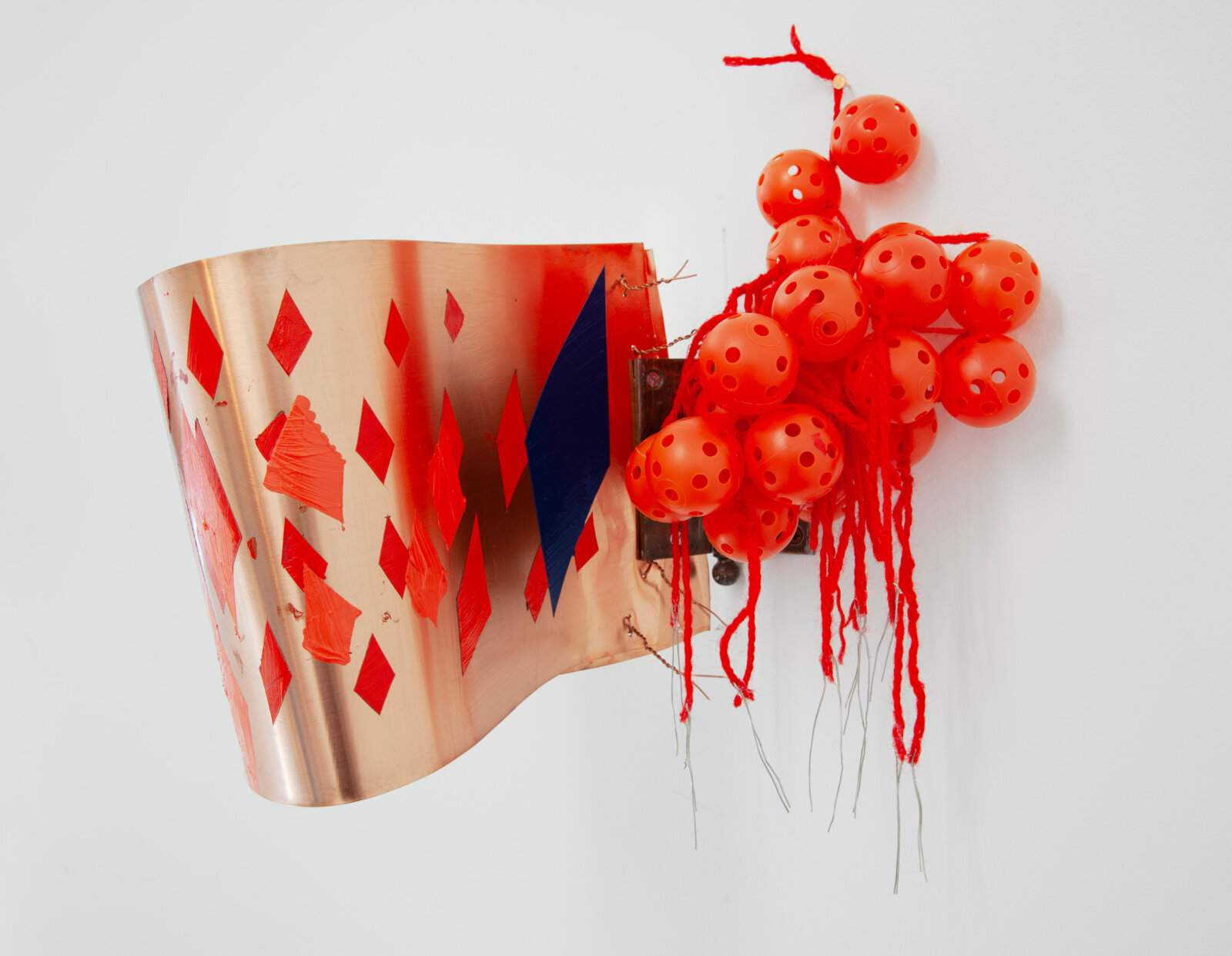 Jessica Stockholder, JS532, 2012, copper flashing, hardware, yarn, oil paint, red plastic balls, wire, hinge, 16 x 12 x 11 in. (41 x 31 x 28 cm)