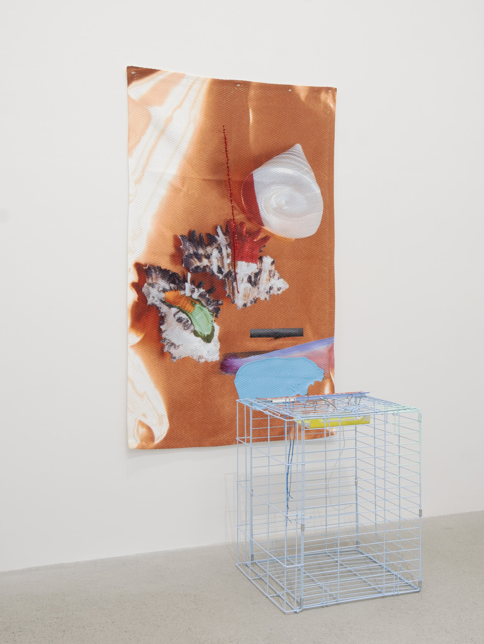 Jessica Stockholder, Killing it, 2020, cage, computer keyboard, hard drive casing, wire, oil and acrylic paint, photo printed on textured fabric, string, 74 x 36 x 29 in. (188 x 91 x 74 cm)