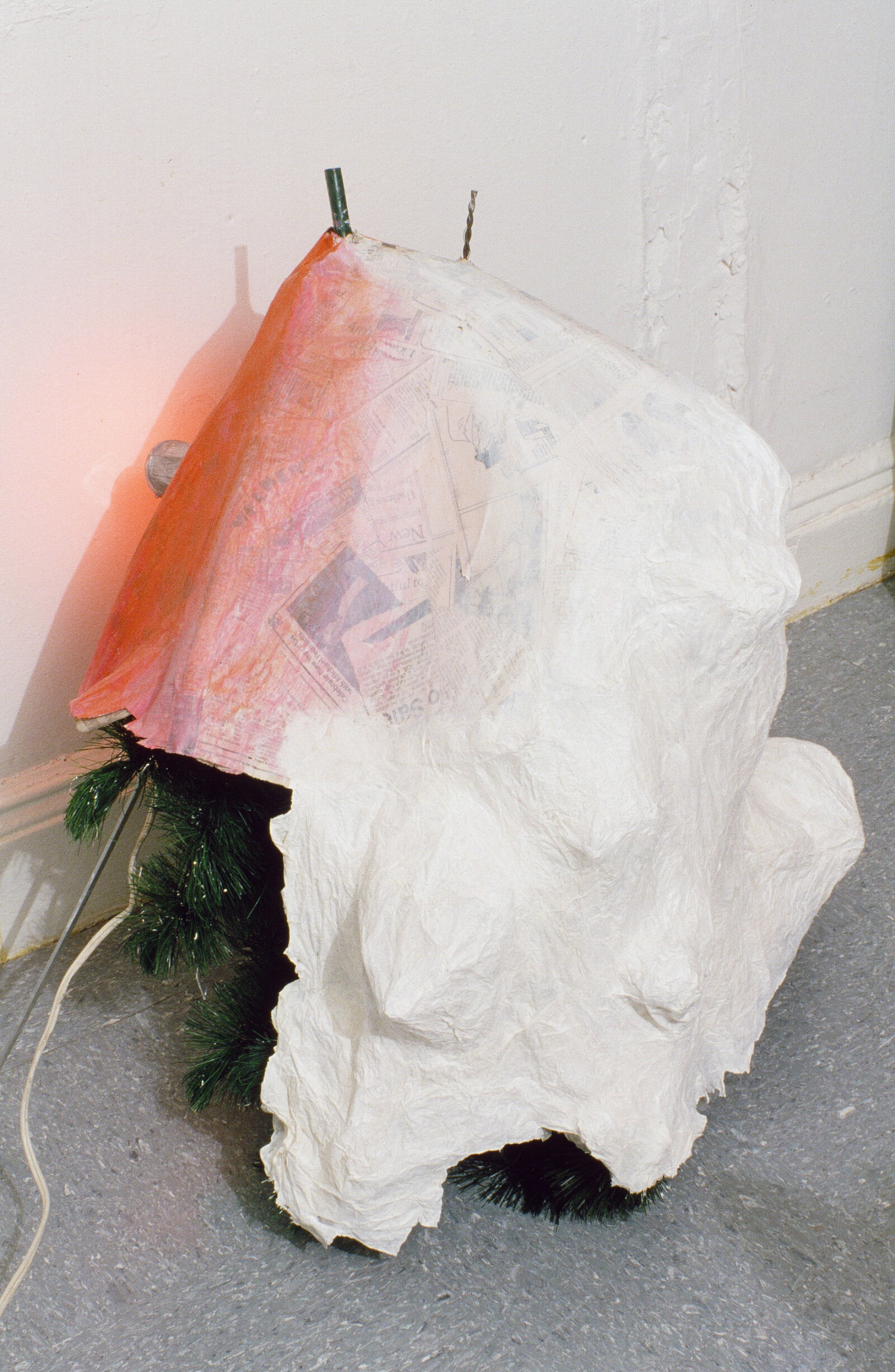 Jessica Stockholder, Kissing the Wall #3, 1988, fake christmas tree, paper maché, paint, lamp