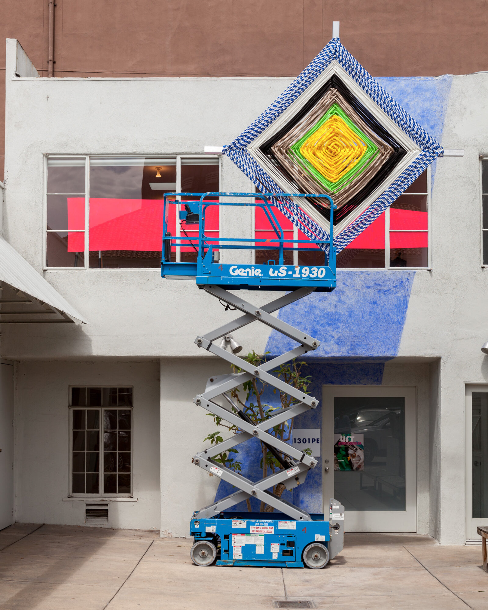 Jessica Stockholder, Lift, 2013, scissor lift, marine rope, aluminum tubing