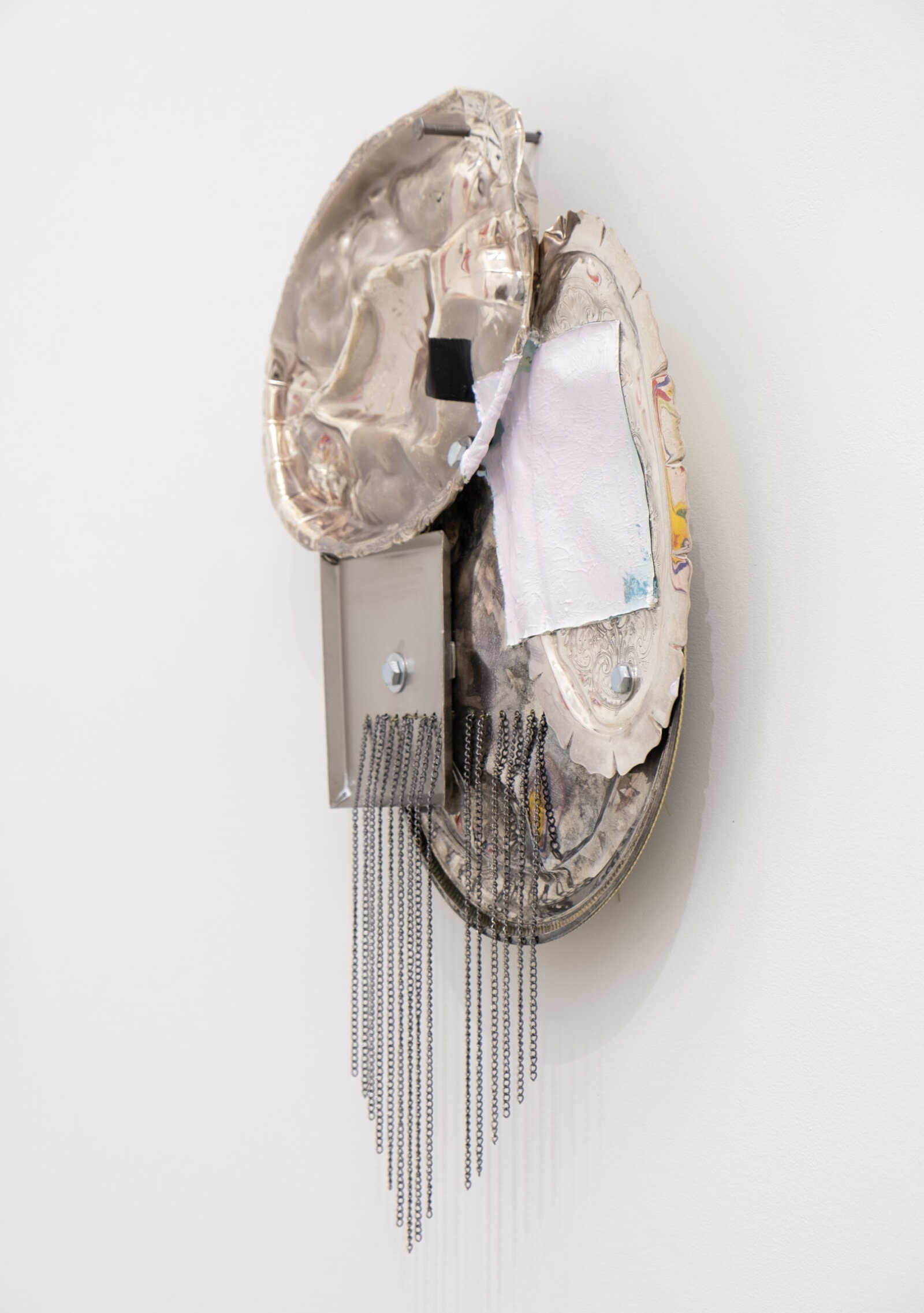 Jessica Stockholder, Origin of the World, 2026, metal trays, hardware, acrylic paint, chain, 20 x 14 x 4 in. (51 x 36 x 9 cm)