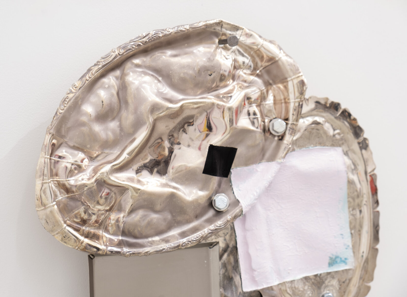 Jessica Stockholder, Origin of the World (detail), 2026, metal trays, hardware, acrylic paint, chain, 20 x 14 x 4 in. (51 x 36 x 9 cm)