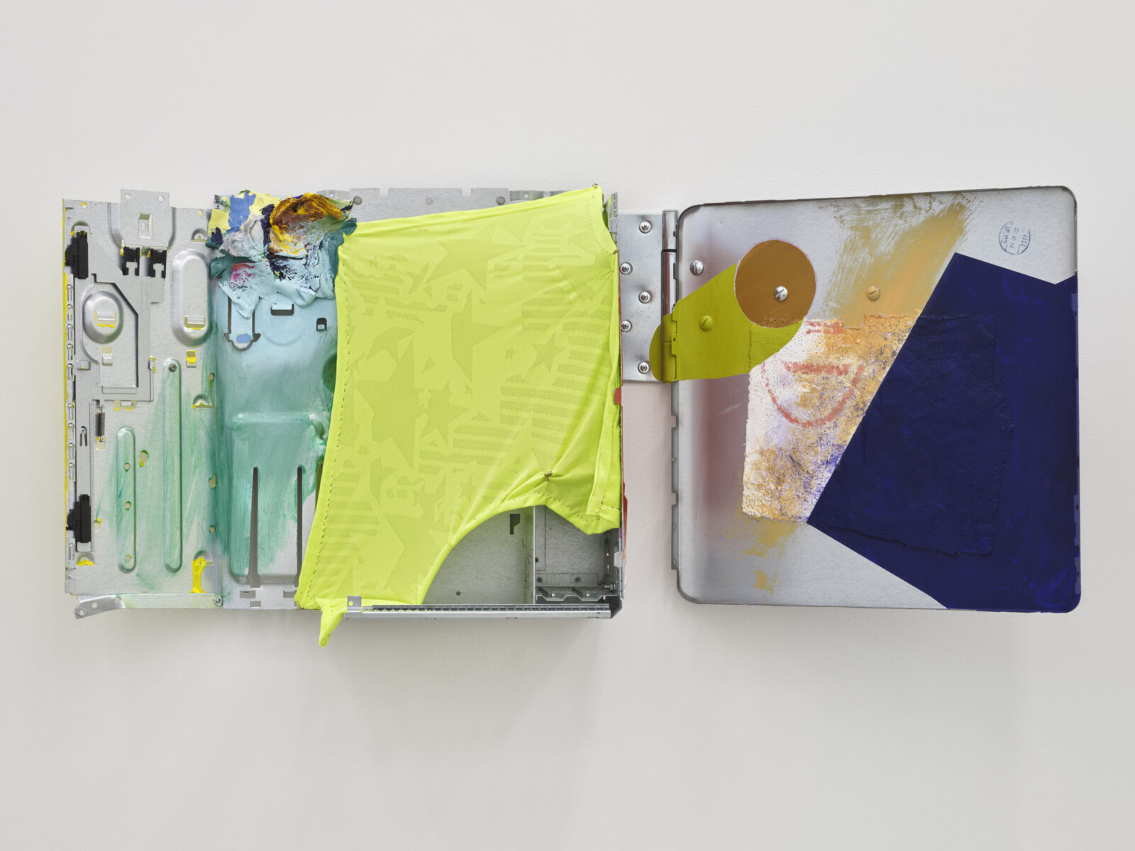 Jessica Stockholder, The Watchman, 2022, computer cases, fabric, thread, acrylic and oil paint, plaster, hardware, glue, 16 x 39 x 8 in. (41 x 98 x 19 cm)