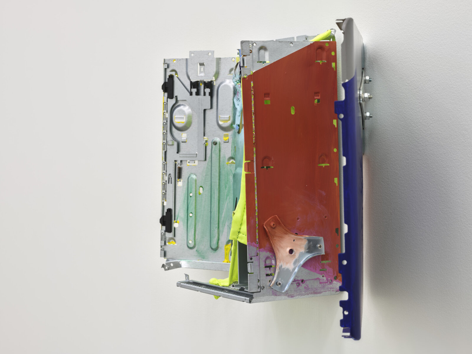 Jessica Stockholder, The Watchman, 2022, computer cases, fabric, thread, acrylic and oil paint, plaster, hardware, glue, 16 x 39 x 8 in. (41 x 98 x 19 cm)