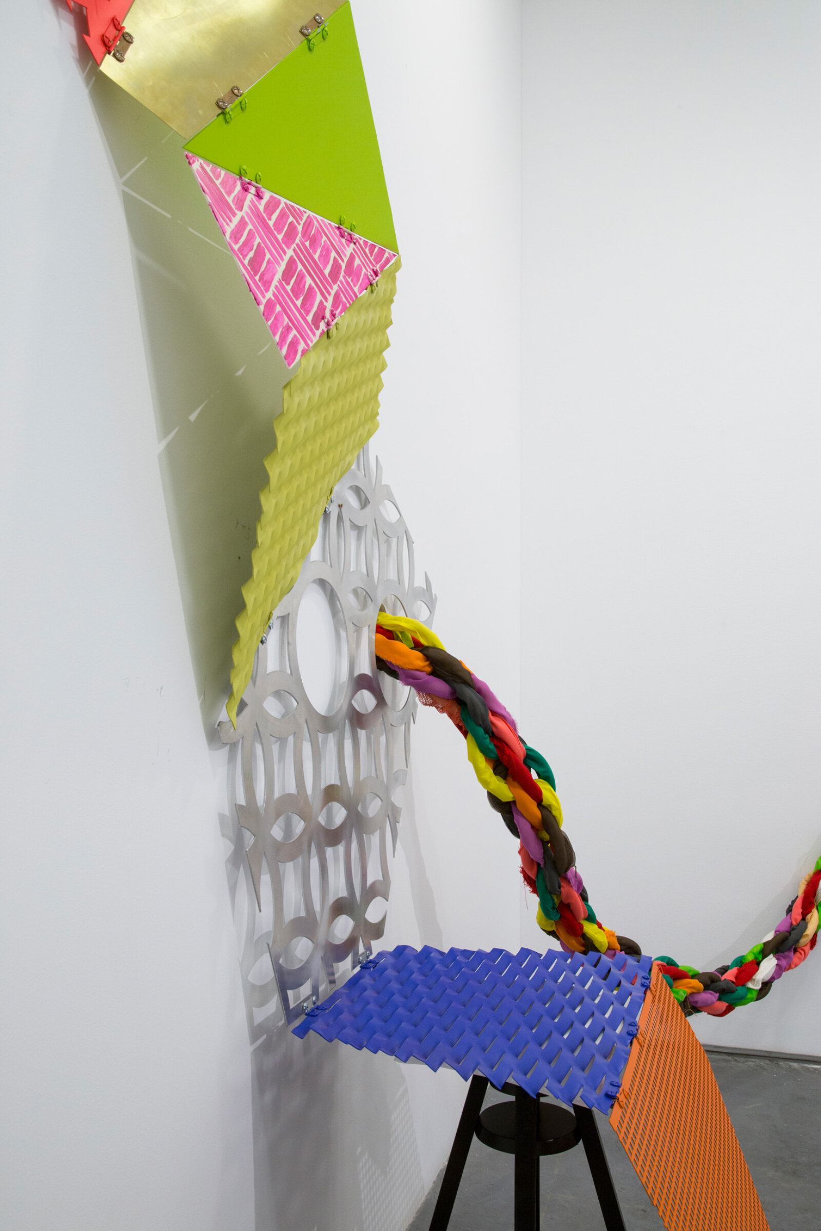 Jessica Stockholder, Tied to be fit – middle period (detail), 2021, perforated sheets, hinges, bolts, paint, stool, 84 x 66 x 44 in. (214 x 168 x 112 cm)