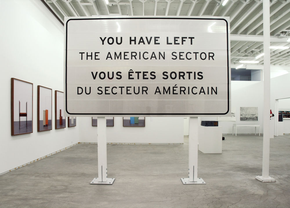 ​Ron Terada, You Have Left the American Sector, 2005, 3m reflective highway vinyl, extruded aluminum, galvanized steel, wood, 120 x 120 x 16 in. (305 x 305 x 41 cm) by 