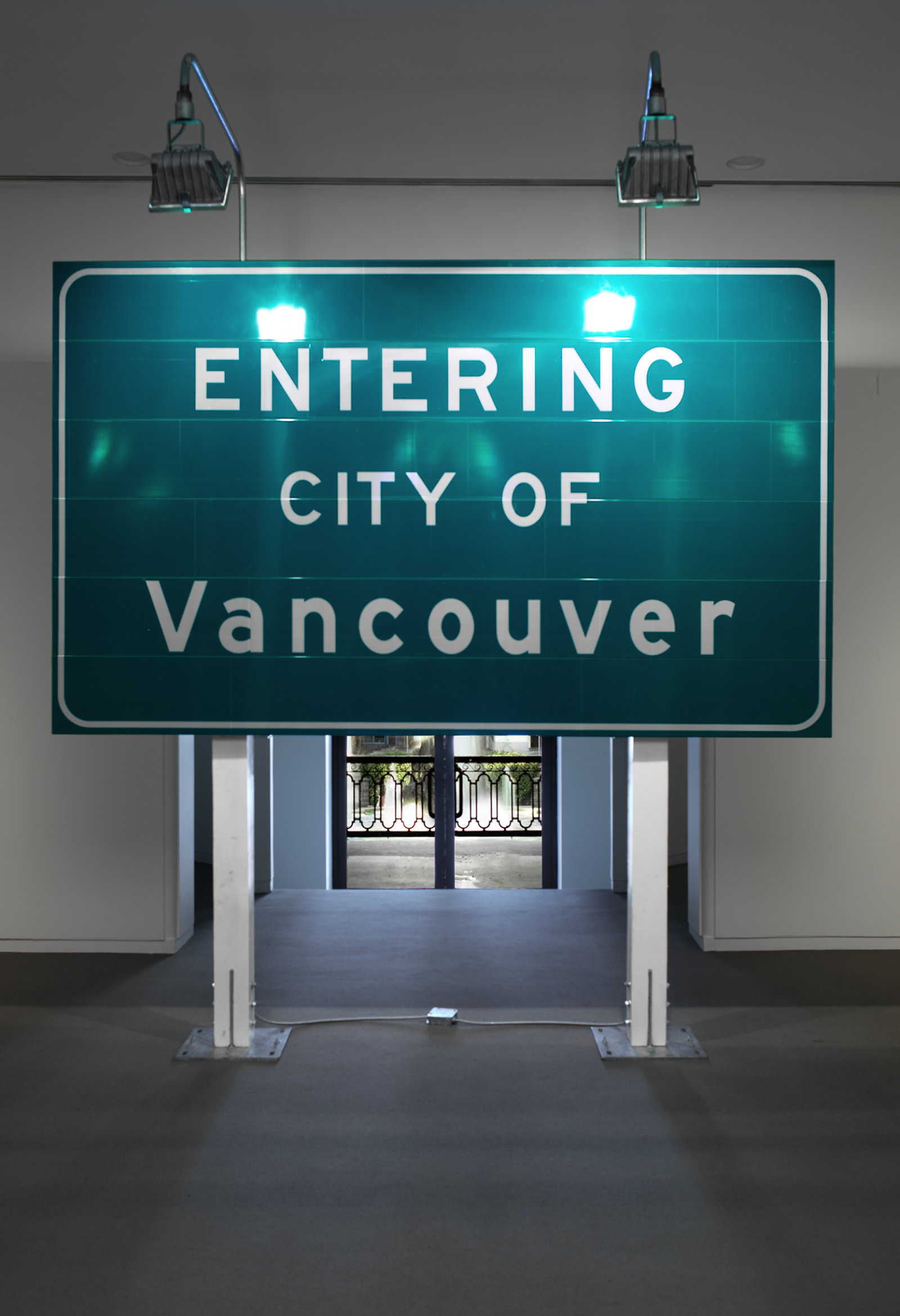 Ron Terada, Entering City of Vancouver, 2002, 3m reflective highway vinyl, extruded aluminum, industrial lights, galvanized steel, wood, 120 x 120 x 60 in. (305 x 305 x 152 cm)