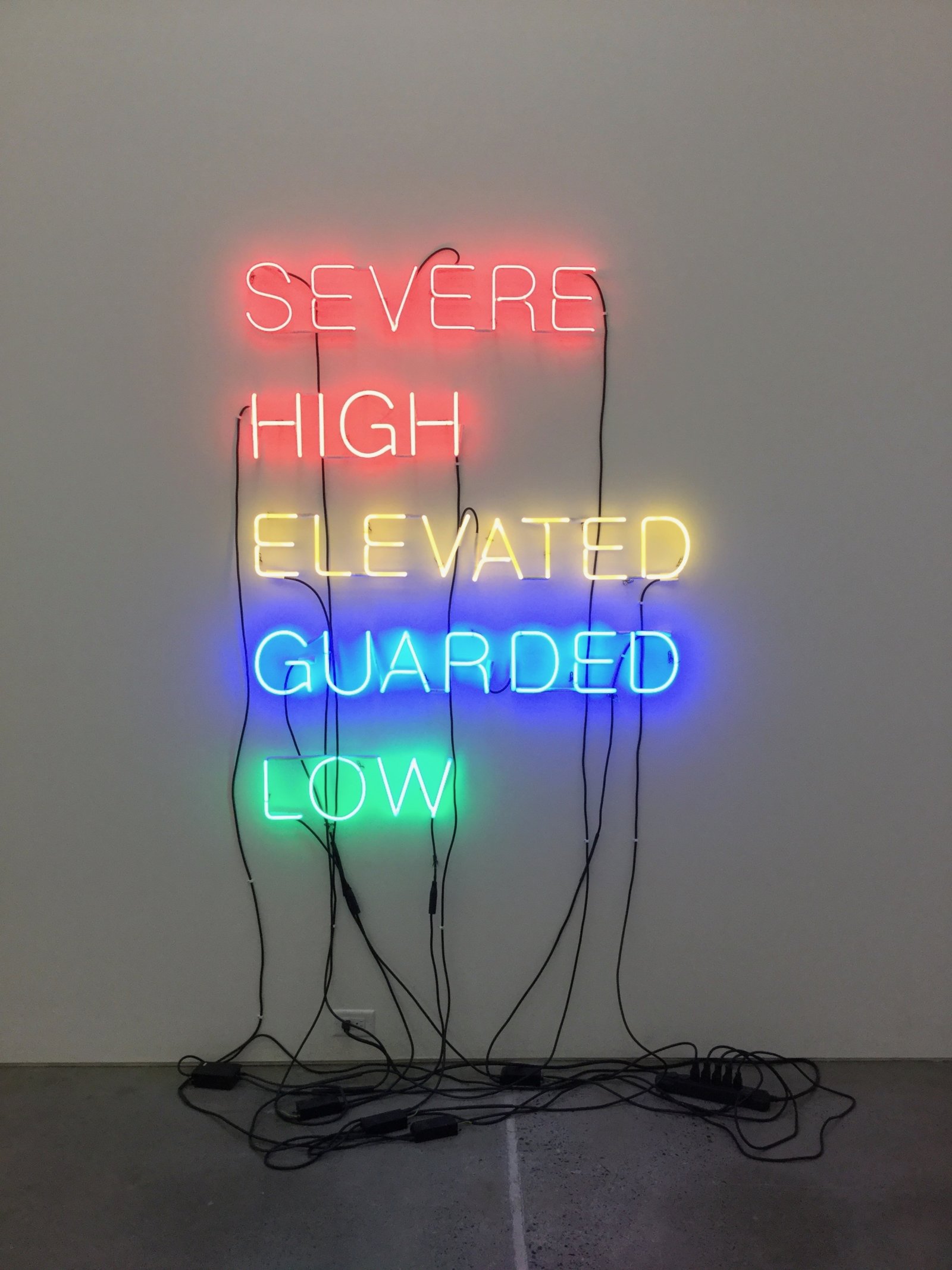 Ron Terada, Five Words in Coloured Neon, 2003, red, orange, yellow, blue and green neon, 67 x 50 x 3 in. (170 x 127 x 8 cm)