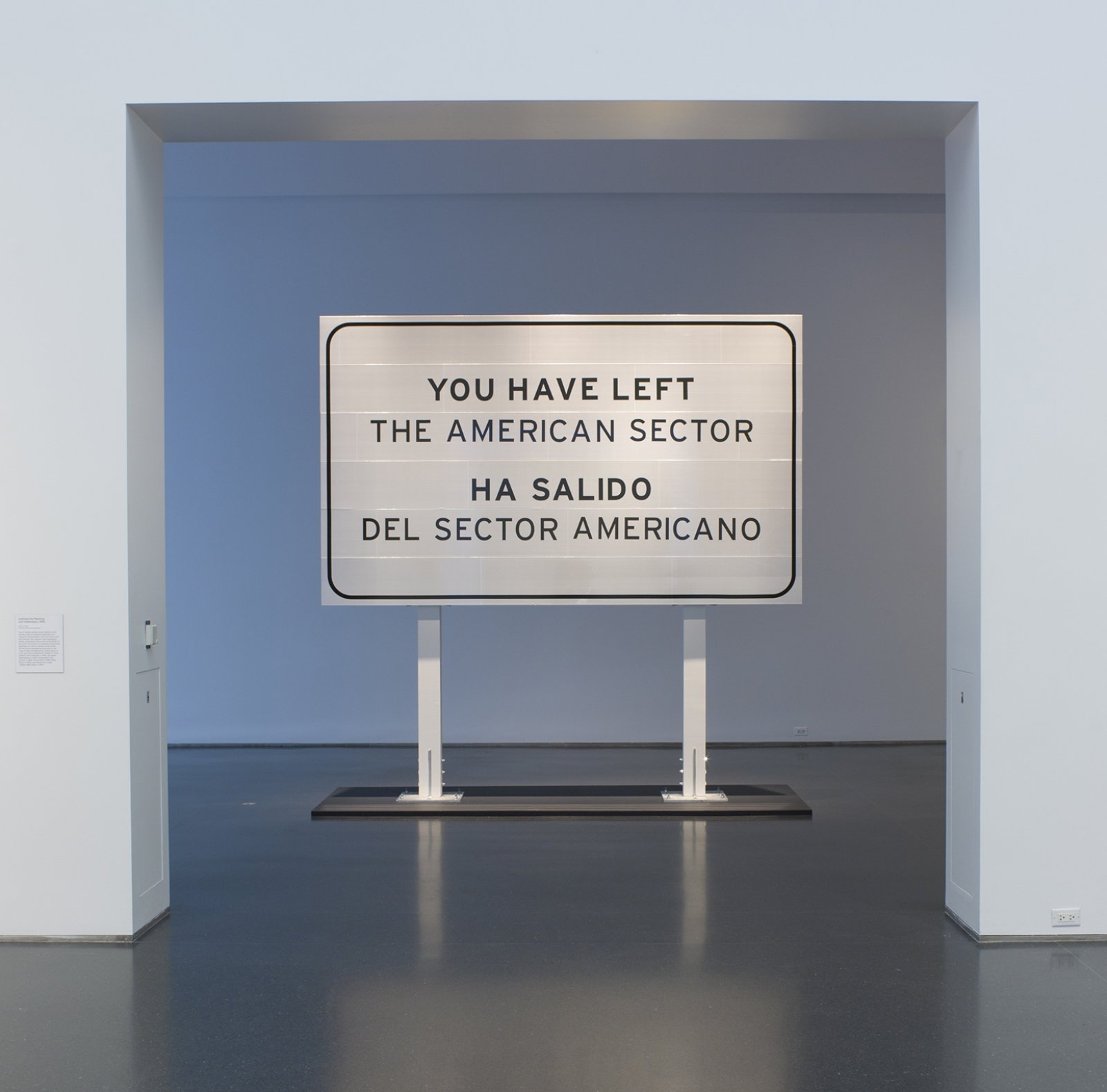 Ron Terada, You Have Left the American Sector, 2005/2011, 3m reflective highway vinyl, extruded aluminum, galvanized steel, wood, 120 x 120 x 16 in. (305 x 305 x 41 cm). Installation view, Being There, MCA Chicago, Chicago, USA, 2011