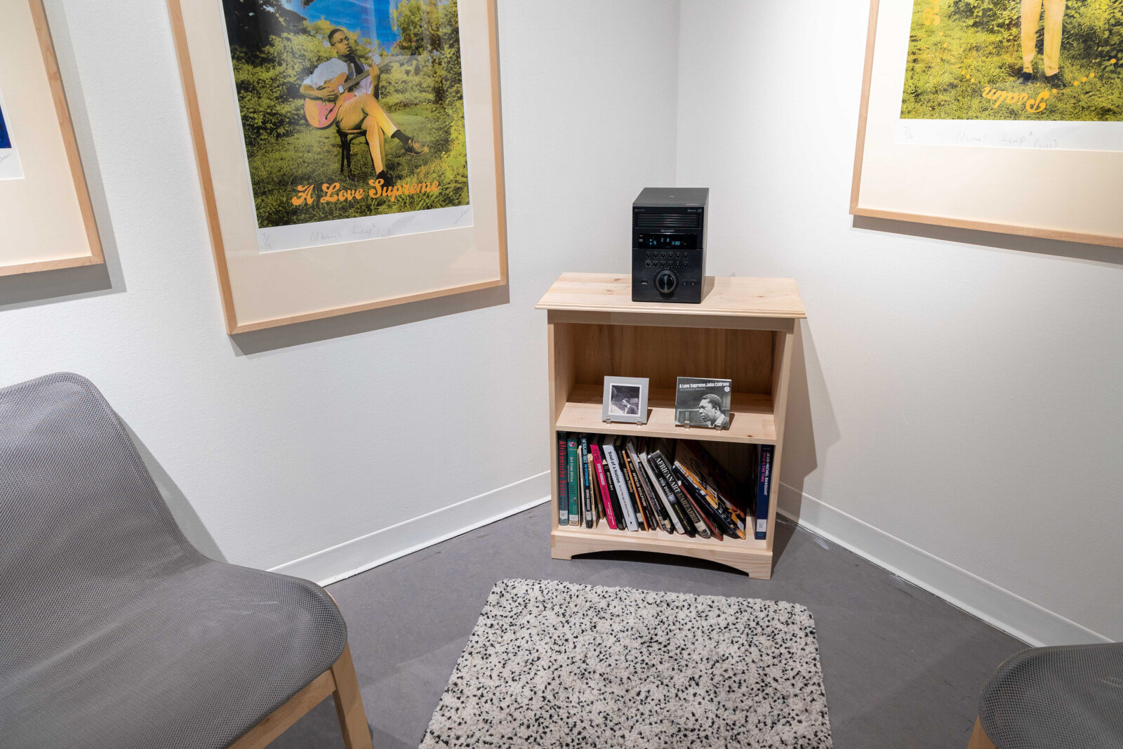 Chukwudubem Ukaigwe, Coltrane’s Leap, 2022–2023, 4 cmyk screenprints, audio of John Coltrane’s ‘A Love Supreme’ (1964), selection of books from Museum’s library. Installation view, Art Gallery of Greater Victoria, Canada, 2023