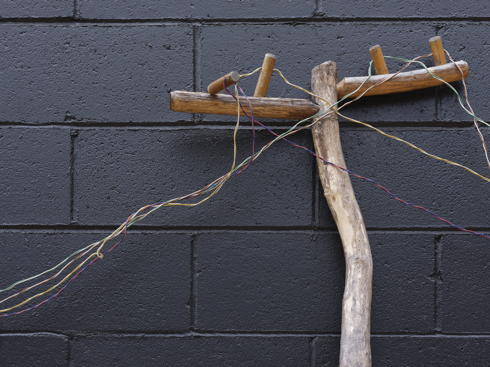 Ashes Withyman, Electrical poles from a place, near the buried canal (detail), 2011–2012, wire, steel, wood, glass bottles, dimensions variable